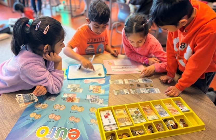 children following an IPC unit on money