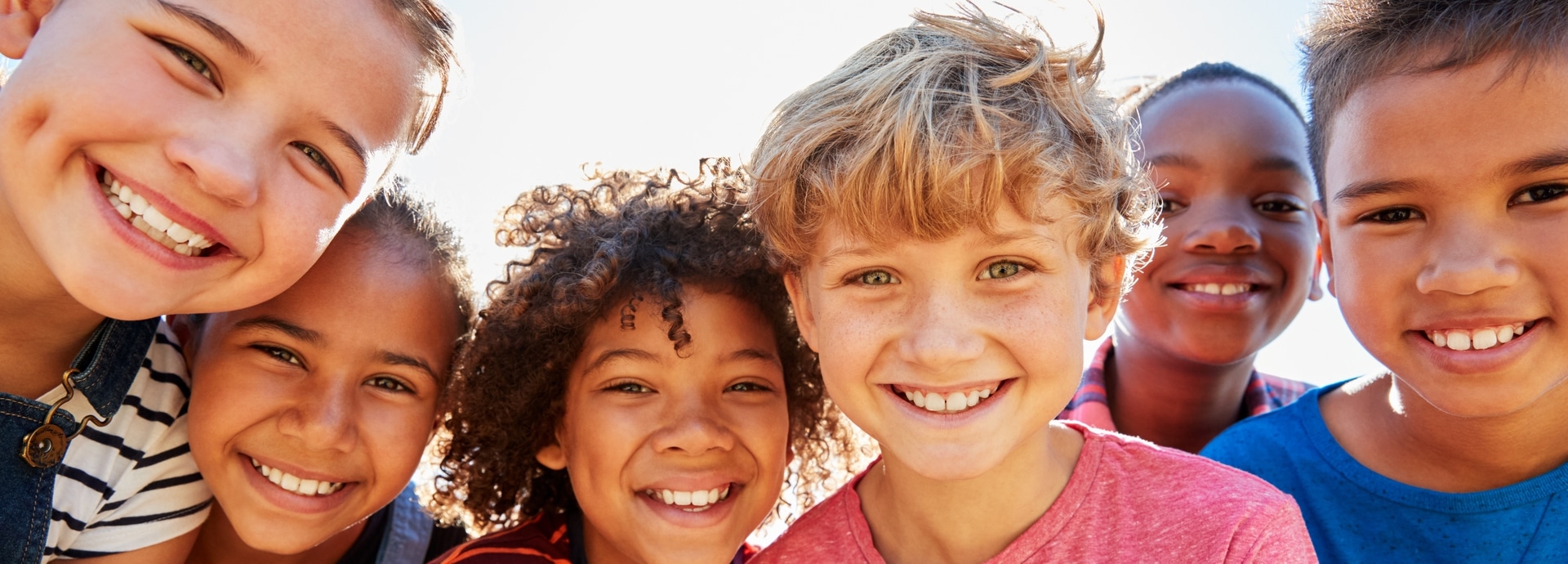 expat kids children smiling