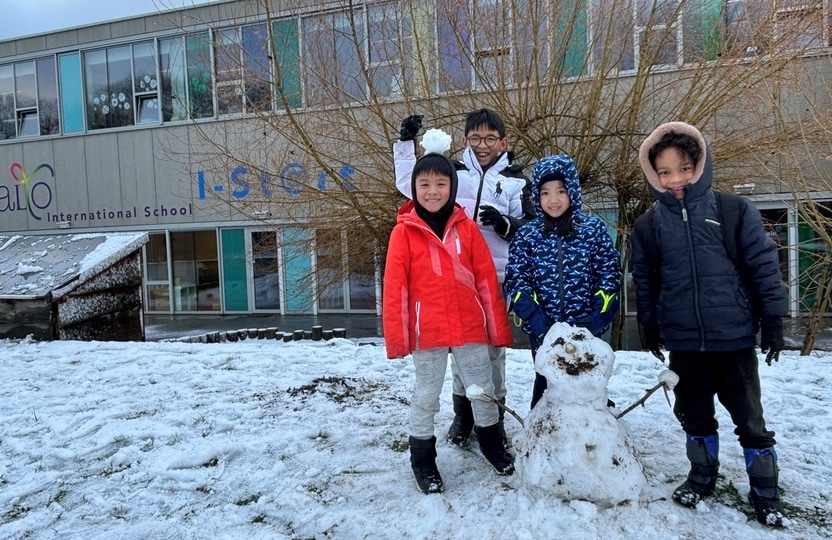 children building a snowman